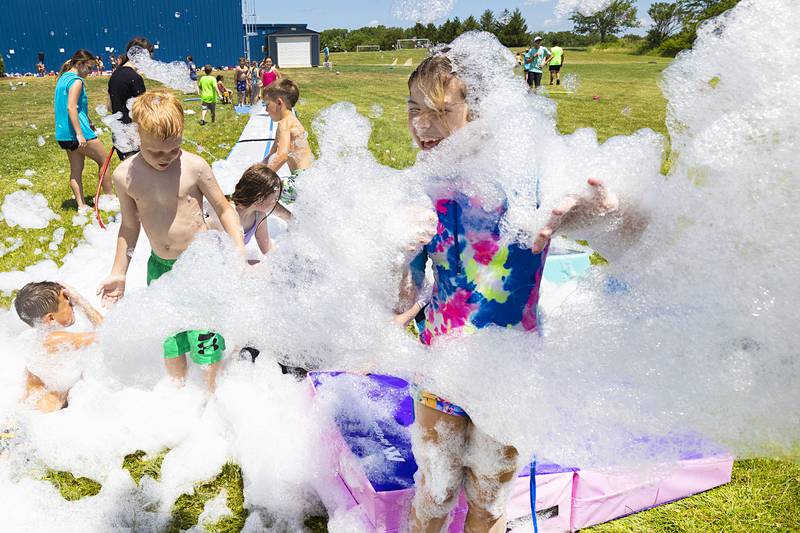 Foam envelopes SPARK campers Tuesday, June 18, 2024 in Dixon. Today’s camp had 150 kids signed up for a day of fun.