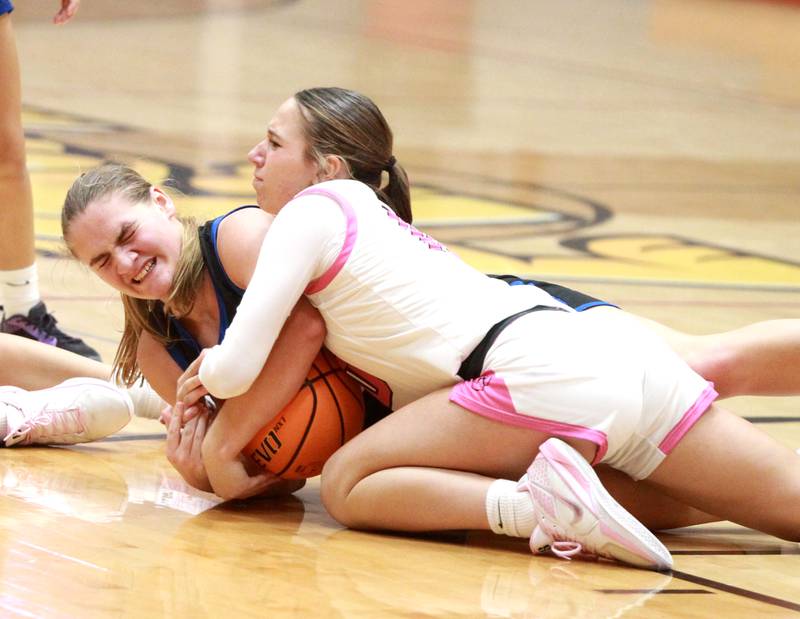 St. Charles North’s Elle Fuhr and Batavia’s Payton Haslett battle for possession of the ball during a game on Monday, Dec. 16, 2024 in Batavia.