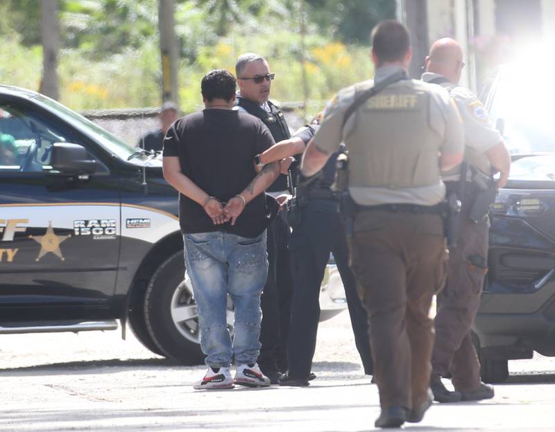 Ottawa Police and La Salle County Sheriff deputies make an arrest in the 1500 block of Scott Street just south of U.S. 6 on Wednesday, Sept, 13, 2023 in Ottawa. A suspect had nearly an hour standoff with police around noon and was taken into custody around 1p.m.