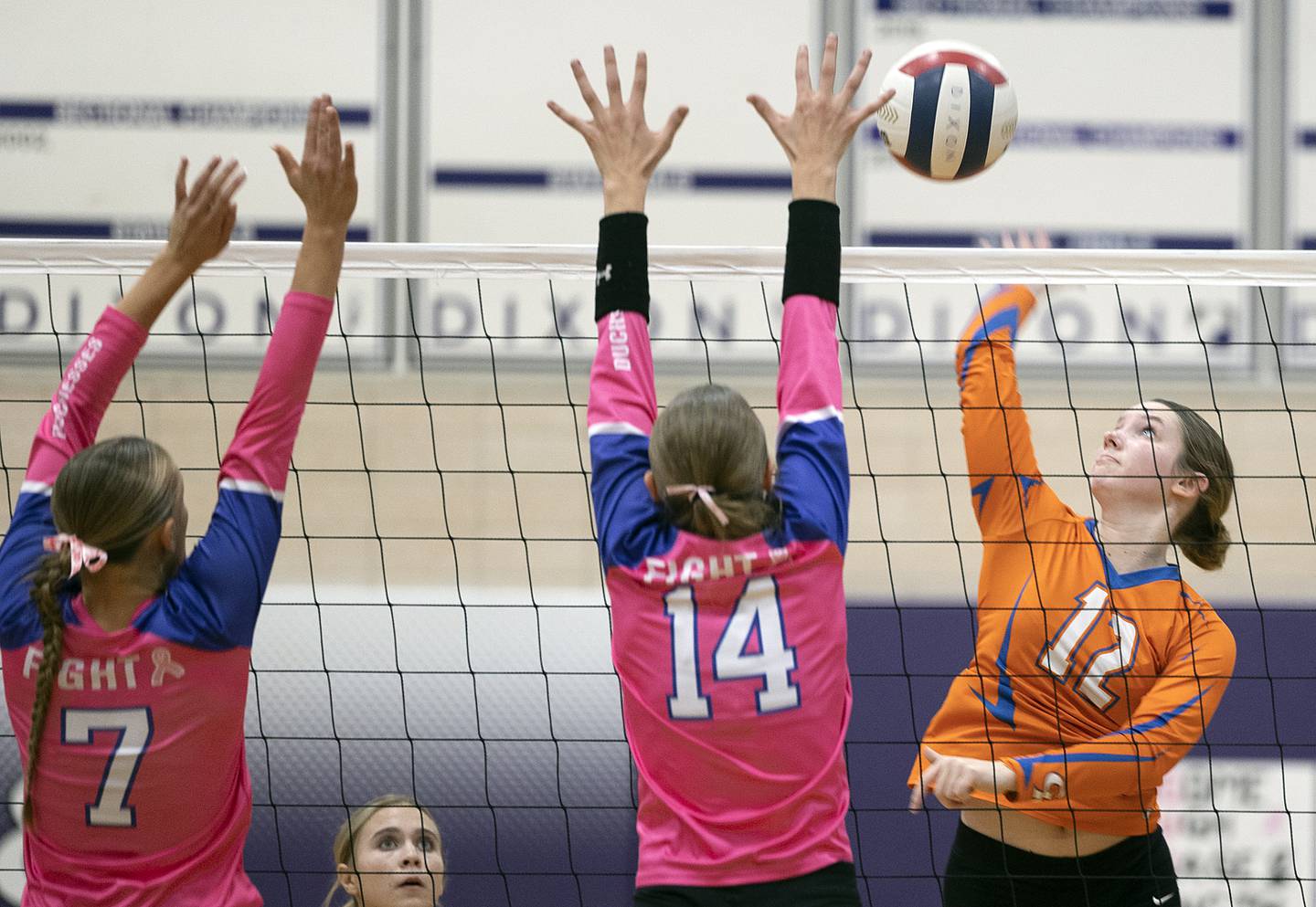 Genoa-Kingston’s Jessie Fredrickson spikes against Dixon Thursday, Oct. 17, 2024.