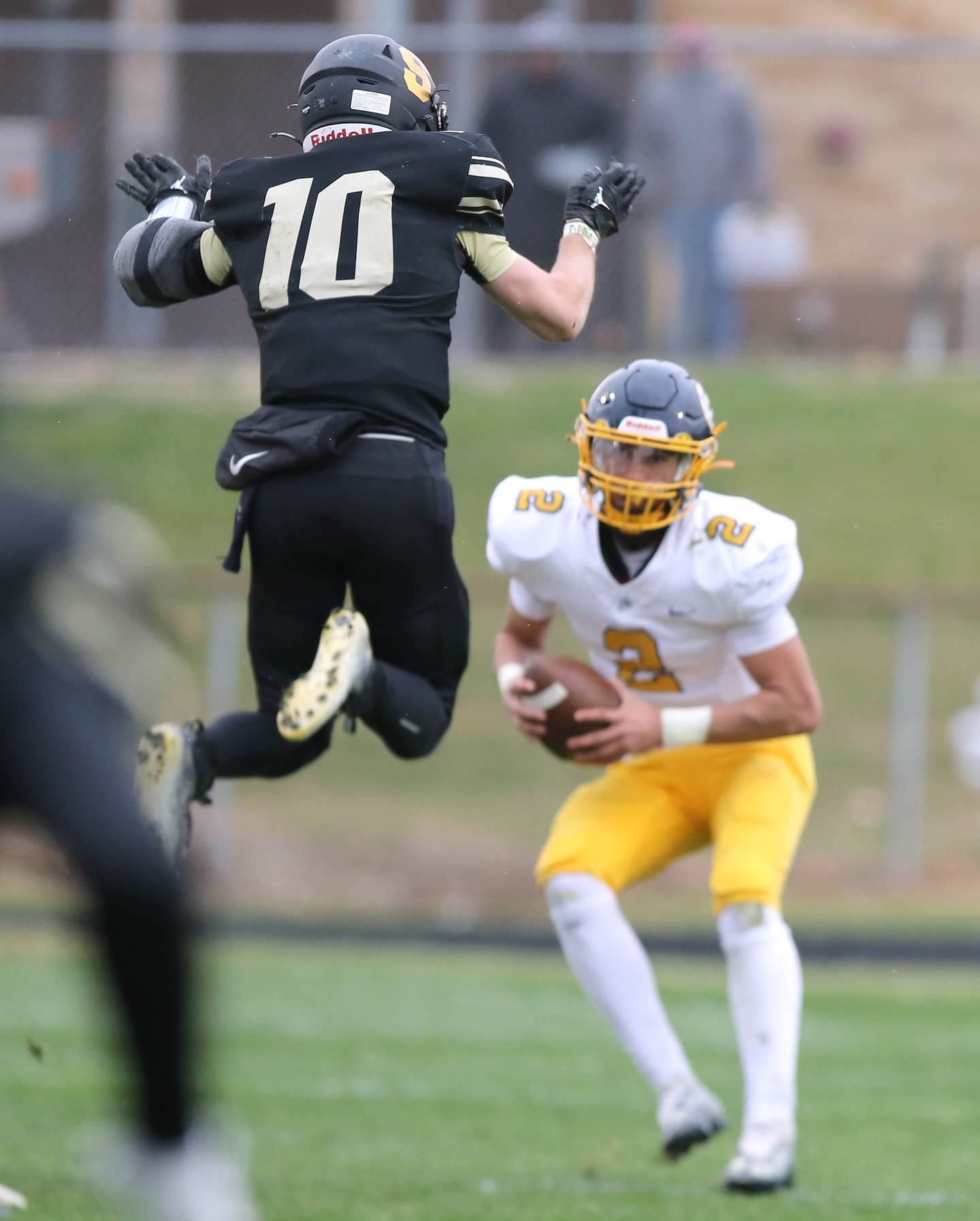 Sycamore's Zack Crawford leaps at Sterling's JP Schilling during their Class 5A state playoff game Saturday, Nov. 12, 2022, at Sycamore High School.
