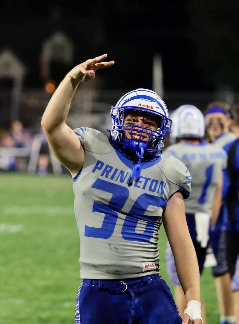 Princeton senior Common Green celebrates the Tigers' 63-12 win over Kewanee on Friday.