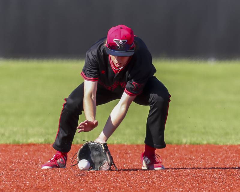 Yorkville's Kamden Muell (9) fields a ground ball to short during baseball game between Oswego at Yorkville. Thursday, May 8, 2025 in Yorkville.