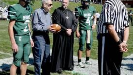 ‘Great papa’ Melvin Baima joins the Brady twins on field at St. Bede
