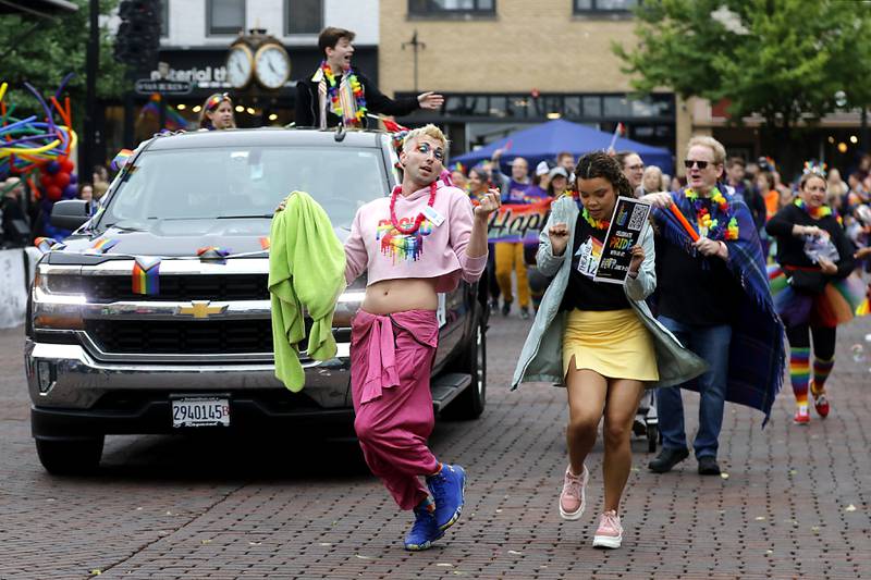 Andrew Hahan and Becca Polk with Theatre 121, dance during the Woodstock PrideFest Parade Sunday, June 11, 2023, around the historic Woodstock Square.