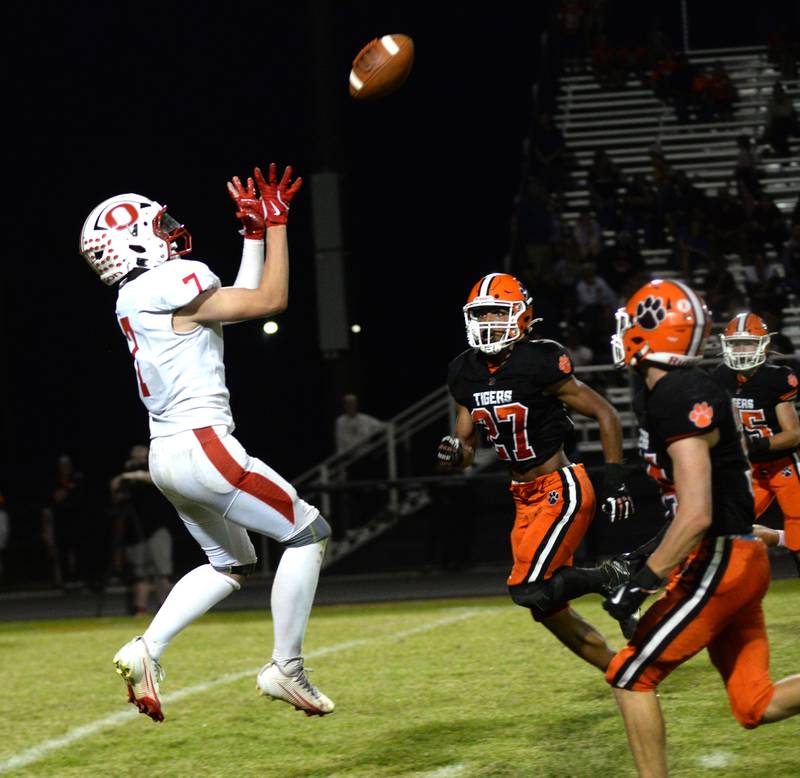 Oregon's Ethan Peeling (7) jumps to try and catch a pass against Byron on Friday, Sept. 12, 2025 at Everett Stine Stadium in Byron.