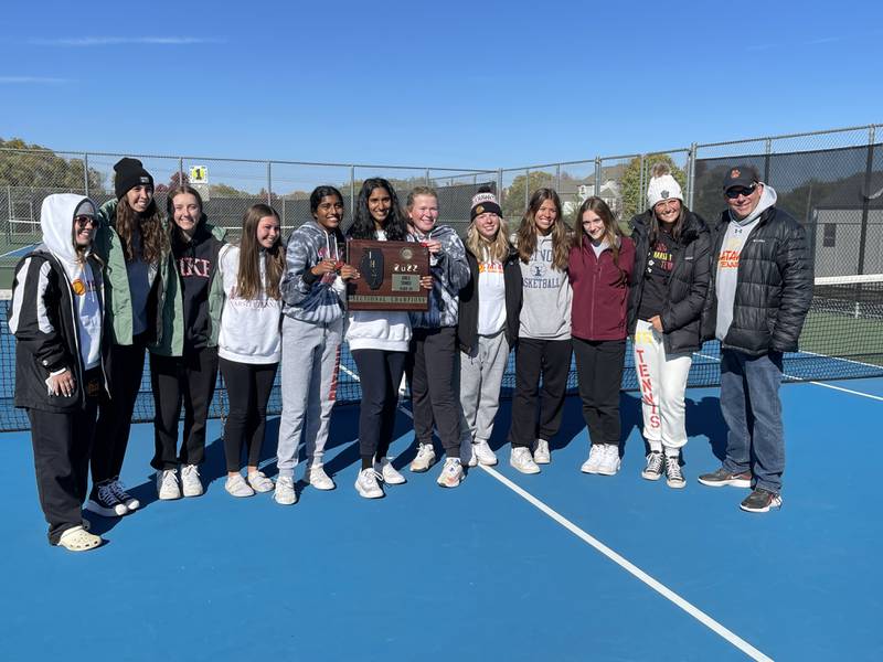 The Batavia girls varsity tennis team posing with the Class 2A sectional team plaque on Saturday, Oct. 15. Photo by Jake Bartelson.