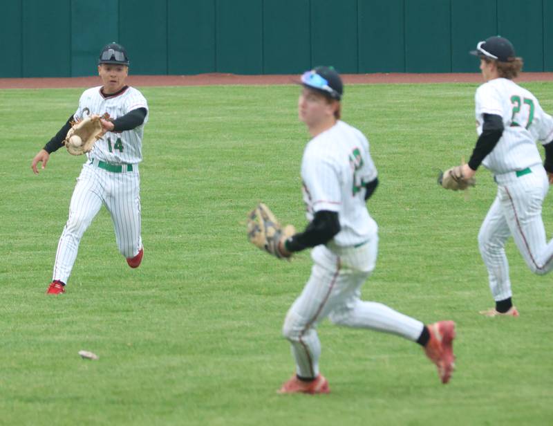 L-P's Adan Pantoja fields a ground ball as teammates Ceyton Urbanski and Grey Ernat assist on Thursday, April 30, 2026 at Huby Sarver Field in the L-P Athletic Complex in La Salle.