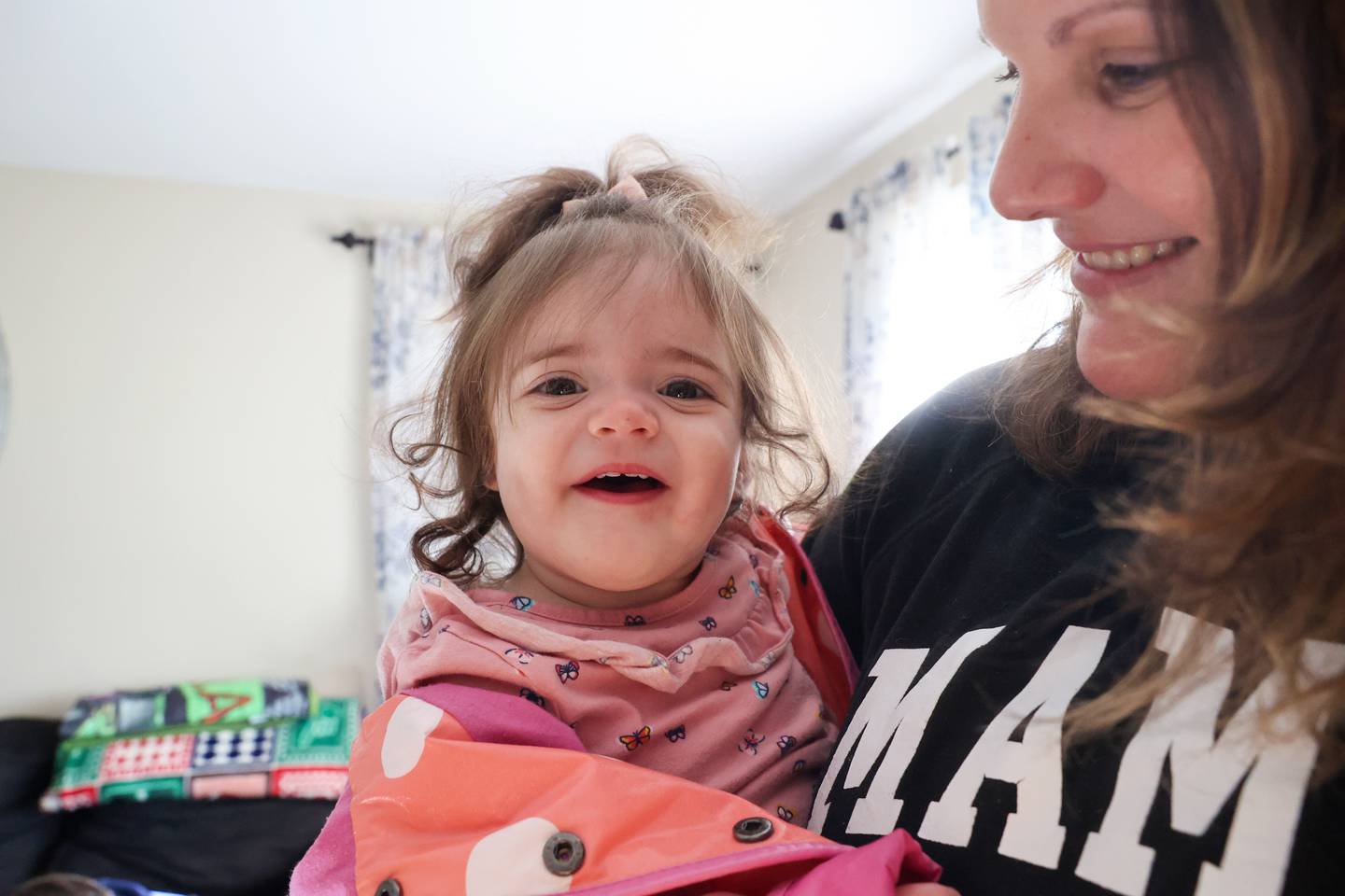 Katie Lisko holds her 1-year-old daughter Jamie in their Bradley home where she and her husband, Jason, and son, Bennett, 4, reside. Lisko, a patient with Westwood Obstetrics & Gynecology at Saint Mary's, credited the practice for helping her address health dilemmas and navigate a journey through infertility leading to the delivery of both of her children and saving Jamie's life last year.