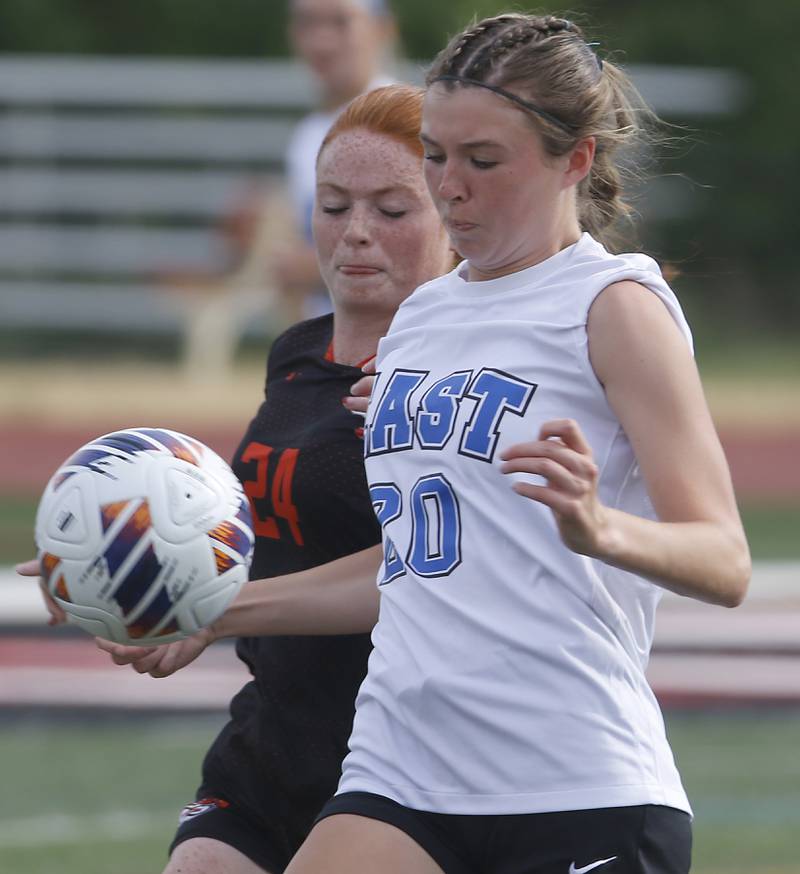 Libertyville’s Ellie Rebman and Lincoln-Way East's Breanna Herlihy chase after the ball  during the IHSA Class 3A state third-place match at North Central College in Naperville on Saturday, June 3, 2023.