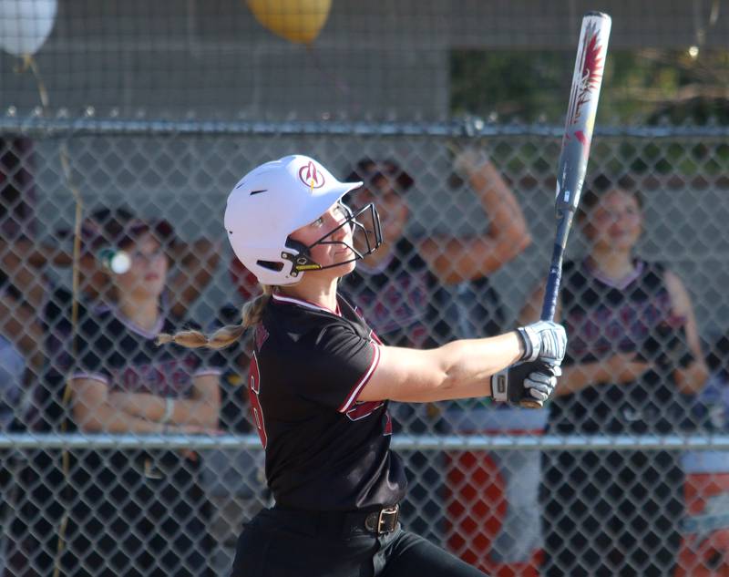 Richmond-Burton’s Taylor Davison makes contact against Woodstock North in varsity softball at Richmond on Thursday.
