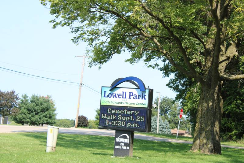 The sign outside Lowell Park in a file photo from late last summer. There will be a cleanup day along the road from Dixon to the park on April 22.