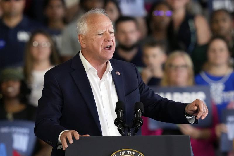 Democratic vice presidential candidate Minnesota Gov. Tim Walz speaks at a campaign rally Wednesday, Aug. 7, 2024, in Romulus, Mich., with Democratic presidential nominee Vice President Kamala Harris. (AP Photo/Carlos Osorio)