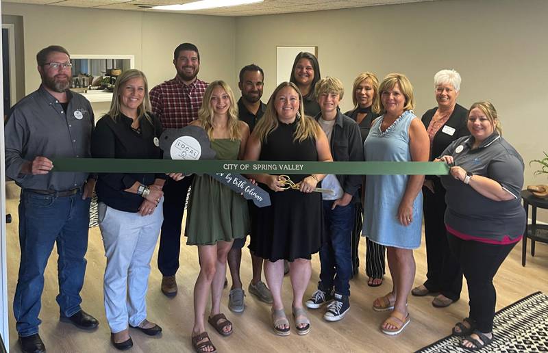 A recent ribbon cutting celebrated Local Realty's opening of an office in Spring Valley.