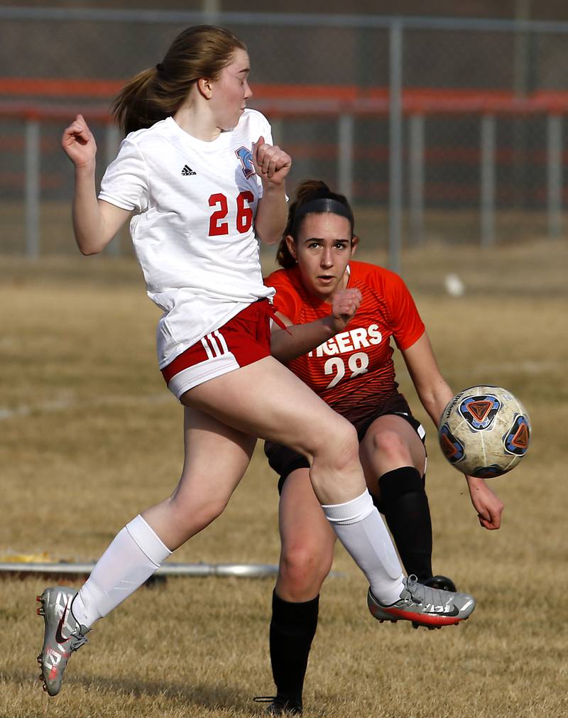 Marian Central's Greta Fortin. Left, blocks the shot on goal by Crystal Lake Central's Jillian Mueller, right, during a non-conference soccer match Monday, March 21, 2022, between Crystal Lake Central and Marian Central at Crystal Lake Central High School.