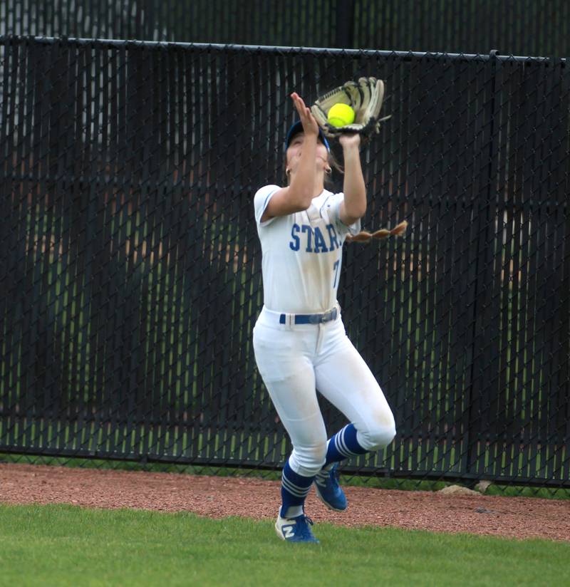 St. Charles North's Mackenzie Patterson makes a catch in left field during a game against Lake Park on Wednesday, April 30, 2025 in St. Charles.