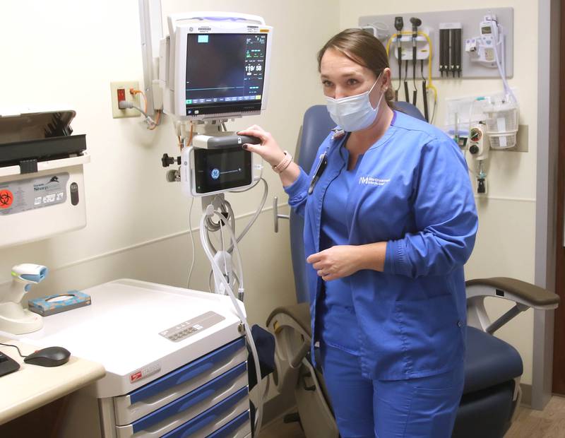 Kila Hittenmiller, a registered nurse in the emergency department at Northwestern Medicine Kishwaukee Hospital, talks Wednesday, Oct. 20, 2021, about some of the upgraded technology in one of the new triage rooms during a tour of the recently opened phase 1 at the facility. The full $12 million renovation of the emergency department is expected to be completed in Sept. 2022.