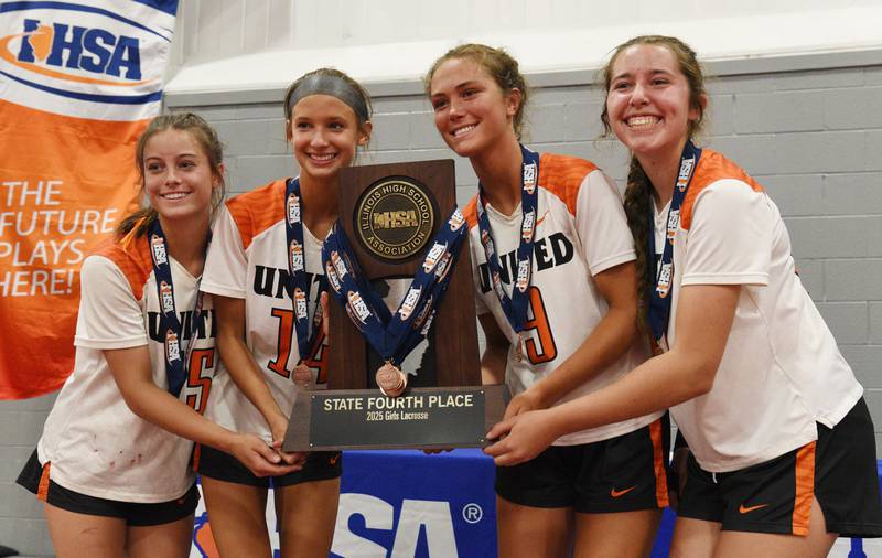 Crystal Lake Central Coop captains, from left, Emma Sieg, Addie Bechler, Fiona Lemke and Anna Starr hold their team’s fourth-place trophy at the conclusion of the girls lacrosse state finals at Hinsdale Central High School on Saturday, June 7, 2025.