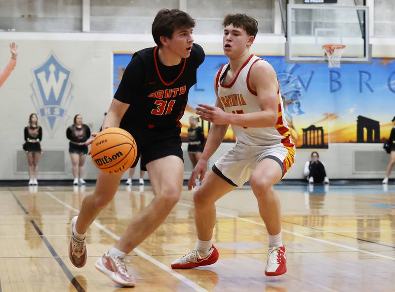 Wheaton Warrenville South's AJ Rogers (31) drives to the basket during the IHSA boys class 4A Willowbrook regional final between Wheaton Warrenville South and Batavia on Friday, Feb. 27, 2026 in Villa Park, IL.