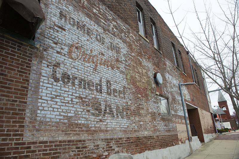 The developers plan to renovated the iconic mural on the side of the Haymarket building.