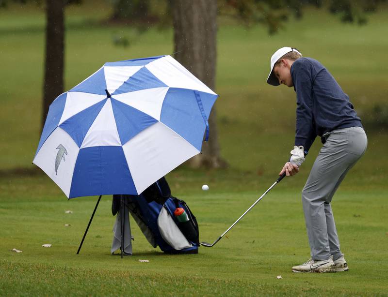 James Gaither, Wheaton North, chips to the green during the DuKane Conference Boys Varsity Tournament Tuesday, Sept. 24, 2024 Bartlett Hills Golf Club.