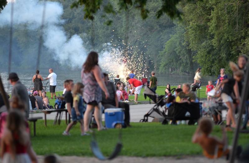 Spectators shoot off a large sparkler at Prophetstown State Park before the fireworks on Saturday, July 6, 2024 in Prophetstown.