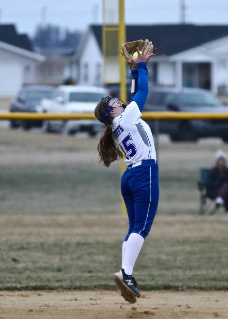 Princeton's Kelsea Klingenberg snags a pop flu Tuesday at Little Siberia Field in Princeton.