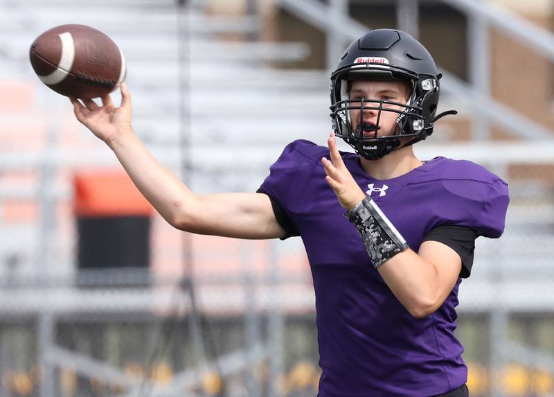 DeKalb’s Carter Guymon throws a pass Wednesday, July 15, 2025, during a summer practice session at the school.