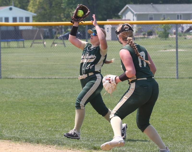 St. Bede's Tessa Dugosh makes a catch in shallow right field as teammate Madelyn Torrence watches in the Class 1A Regional final game on Saturday, May 20, 2023 in Annawan.