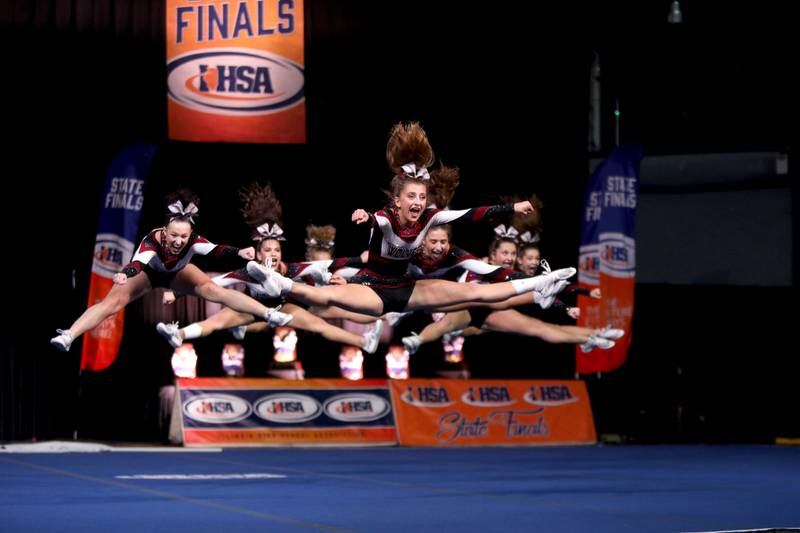 Members of the Prairie Ridge cheerleading team compete in the medium team division of the IHSA State Finals on Saturday, Feb. 8, 2025 at Grossinger Motors Arena in Bloomington.