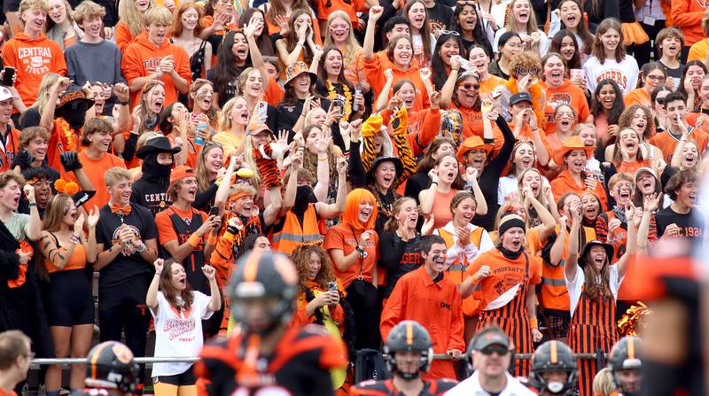 Crystal Lake Central’s fans get revved up in the second half against Burlington Central in varsity football at Crystal Lake Saturday. The Tigers won 25-10.