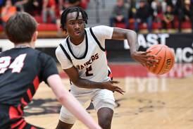 Boys basketball: D.J. Strong, Bolingbrook ride fast start past Benet into sectional final