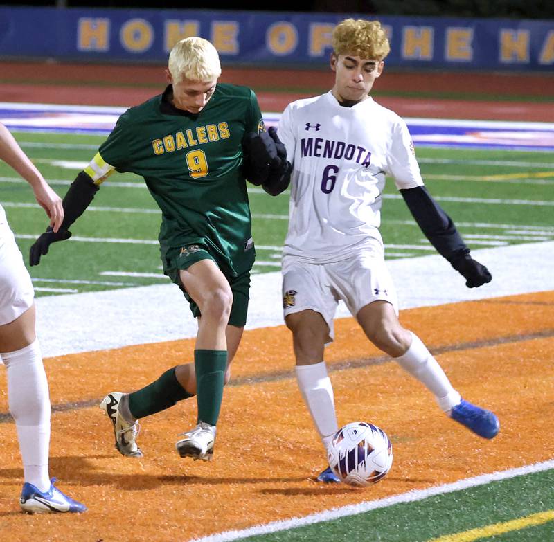 Coal City's Luke Munsterman and Mendota's Danny Garcia try to win possession Thursday, Nov. 6, 2025, during their Class 1A state semifinal game at Hoffman Estates High School.