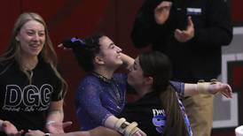Downers Grove co-op sets another record in dominating performance at state gymnastics meet