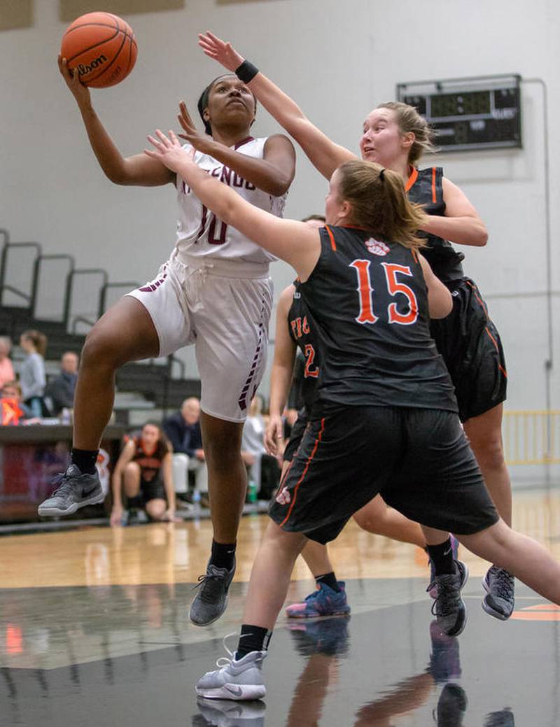 High school girls basketball Marengo, Marian Central secure spots in