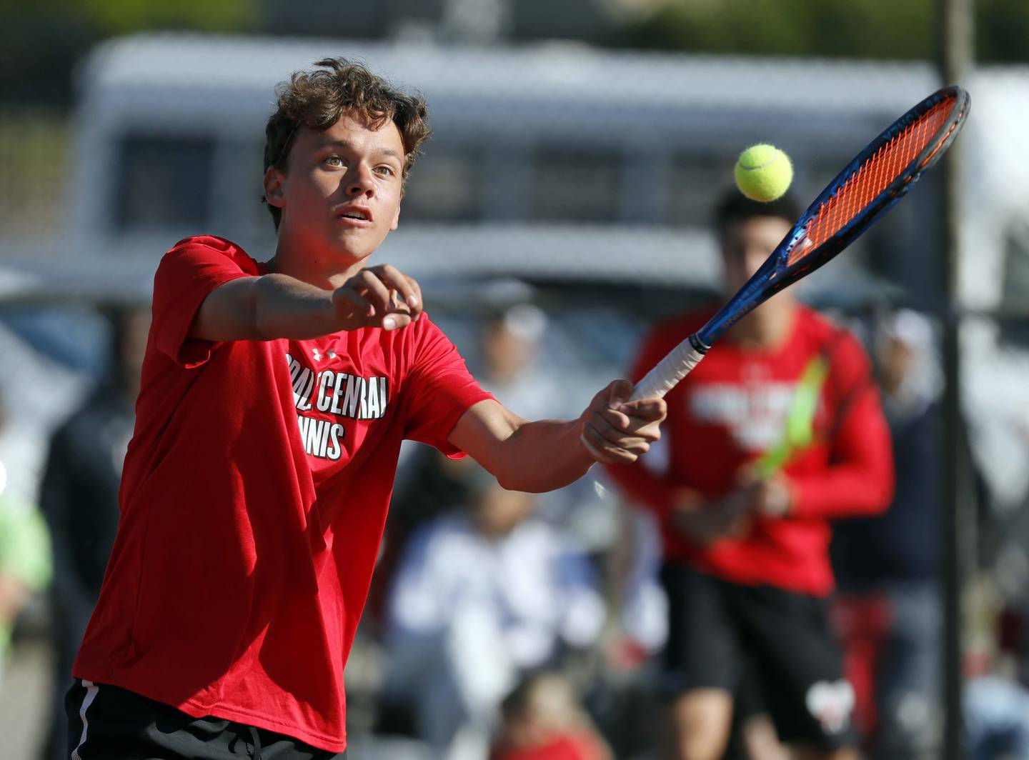 Hinsdale Central's Nathan Hernandez returns a shot Bodie Teuscher against Barrington during the third place match of the IHSA State Tennis Finals Saturday May 27, 2023 in Palatine.
