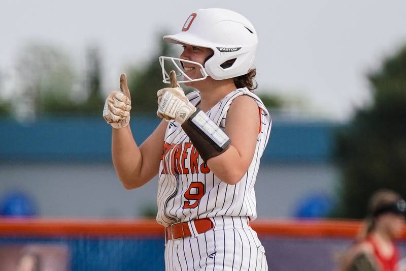 Oswego’s Kennedy Gengler (9) celebrates after hitting a double against Yorkville during a softball game at Oswego High School on Thursday, May 15, 2025.