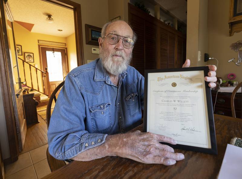 Charlie Willett was awarded a 50 year certificate for his membership in the Dixon American Legion. Willett and his trucking company, Whatever Trucking, was instrumental in moving equipment and artifacts to the Veterans Memorial Park in Dixon.