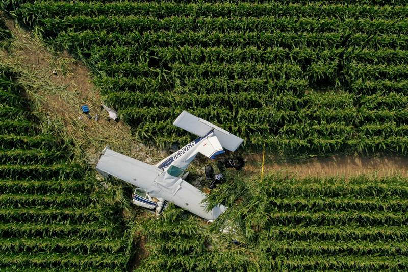 A plane rests in a corn field after crashing near the DeKalb Taylor Municipal Airport in Cortland on Thursday, July 27, 2023.
