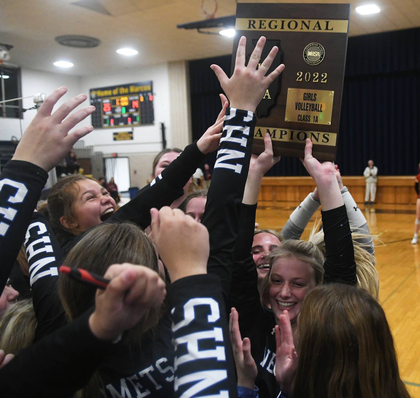 Newman celebrates after winning the 1A Polo Regional by downing Fulton in three sets on Thursday, Oct. 27, 2022.