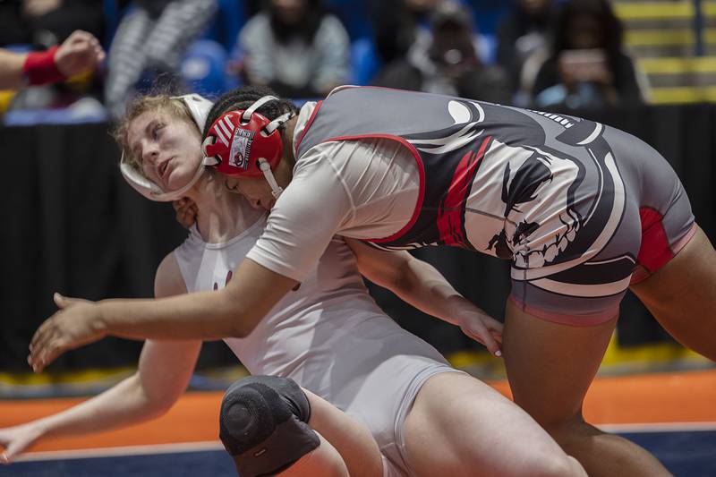 Jasmine Hernandez of Palatine (right) attacks Lexi Ritchie of Unity in the 155 pound third place match at the IHSA girls state wrestling championship Saturday, Feb. 25, 2023.