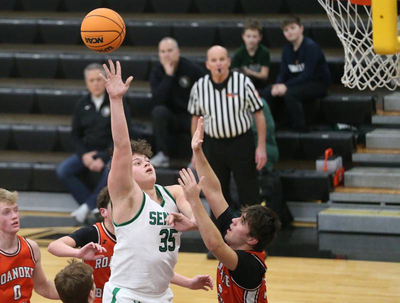 Seneca's Zeb Maxwell lets go of a shot under the hoop against Roanoke-Benson during the Tri-County Conference Tournament on Tuesday, Jan. 27, 2026 at Putnam County High Schooo.