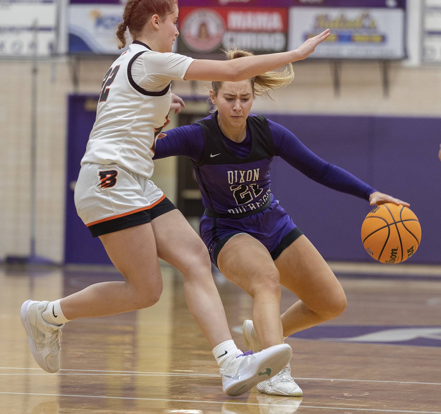 Dixon's Reese Dambman handles the ball against Byron’s Aubrie Fuller Friday, Dec. 27, 2024, during the Dixon Girls KSB Holiday Basketball Classic.