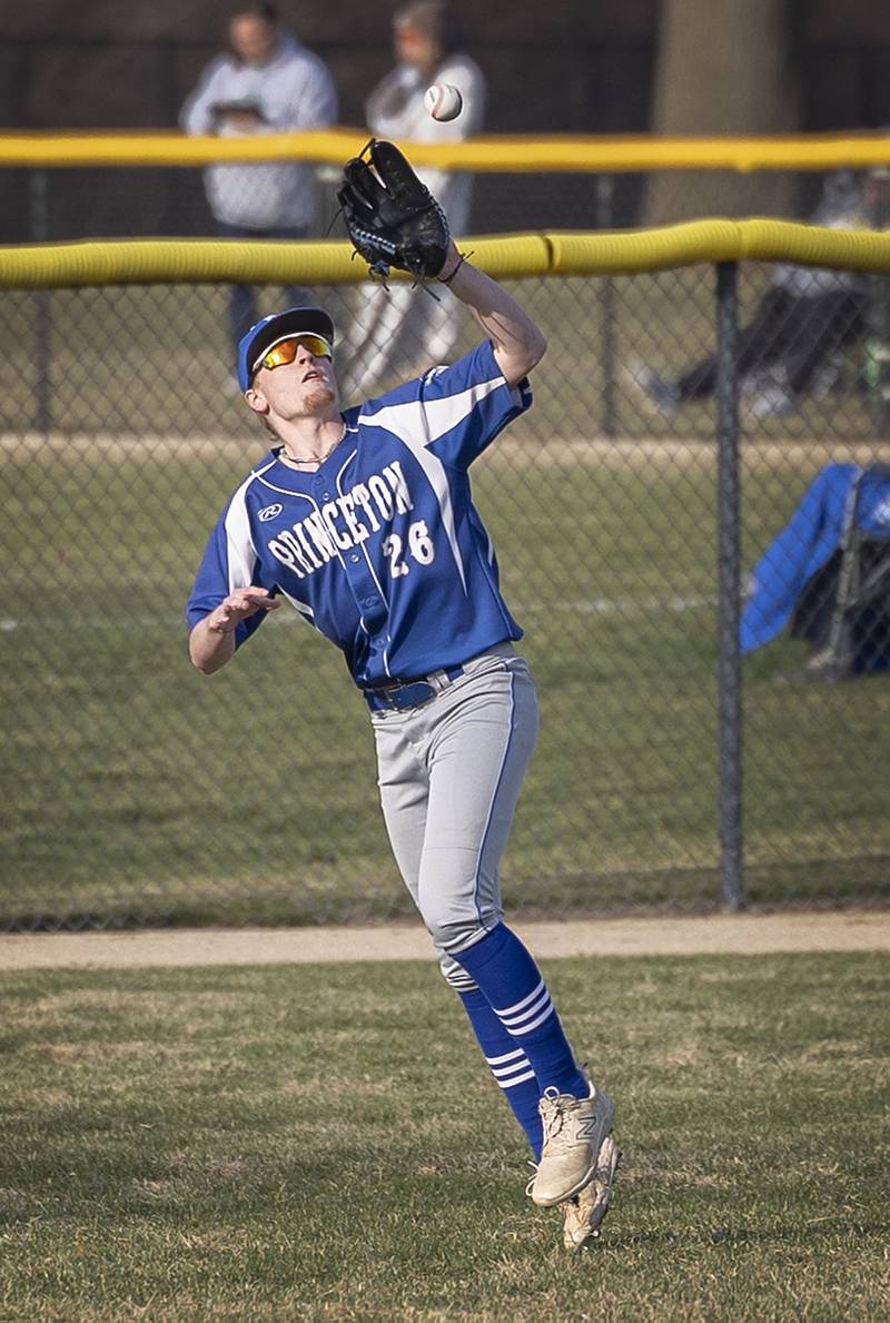 Princeton’s Jace Stuckey hauls in a fly ball in left field for an out against Rock Falls Thursday, March 27, 2025.