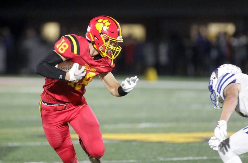 Batavia’s C.J. Valente carries the ball during a home game against Wheaton North on Friday, Sept. 22, 2023.