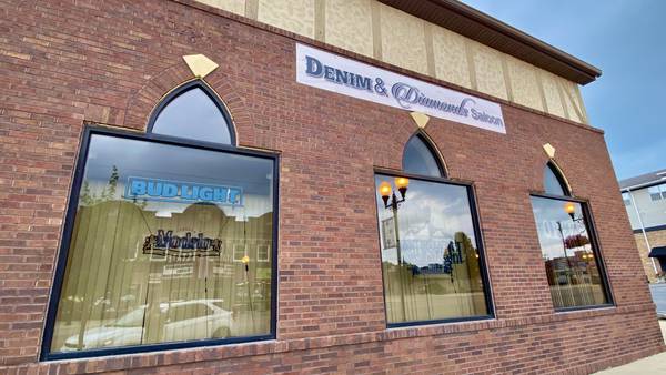 Building housing Denim & Diamonds Saloon up for sale, bar to stay open