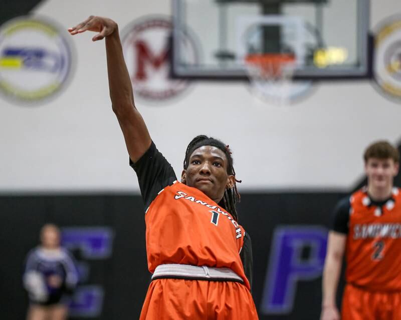 Sandwich's Simeion Harris (1) follows through on a free throw attempt during their basketball game between Sandwich at Plano. Jan 27, 2025 in Plano.