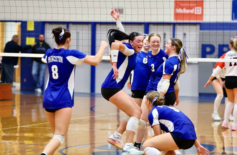 The Princeton Tigresses celebrate Tuesday's regional semifinal win over Kewanee at Prouty Gym. The Tigresses advance to Thursday's finals against Newman.