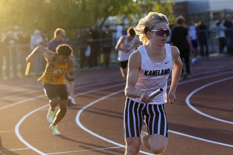 Kaneland’s Joey Schuch takes the first lap in the 4x4 Wednesday, May 20, 2026, at the Rochelle Class 2A boys track sectionals.The team qualified for state.