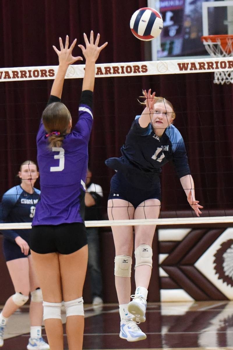 Cissna Park's Sophie Duis, right, sends a hit past Lexington's Jaclyn Grunloh during the IHSA Class 1A Watseka Sectional championship Thursday, Nov. 6, 2025.